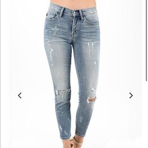 Distressed ankle jeans